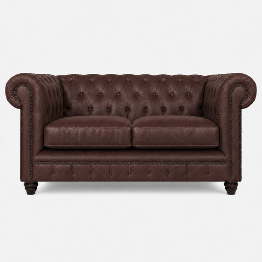 Brown leather sofa with tufted backrest on a white background