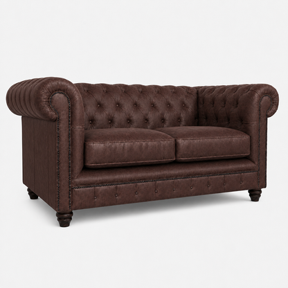 Brown leather sofa with tufted backrest on a white background