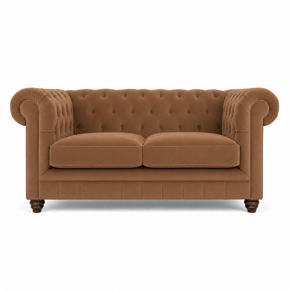 A classic Chesterfield loveseat sofa upholstered in a warm camel brown fabric, featuring deep button tufting on the backrest, rolled arms, two loose seat cushions, and dark wooden legs, shown against a plain white background.