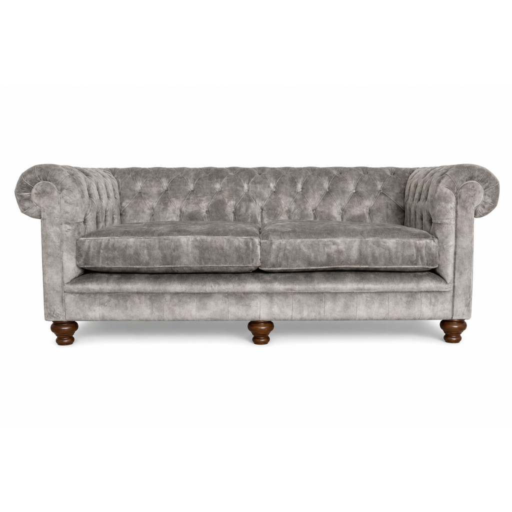 Gray velvet sofa with wooden legs on a white background