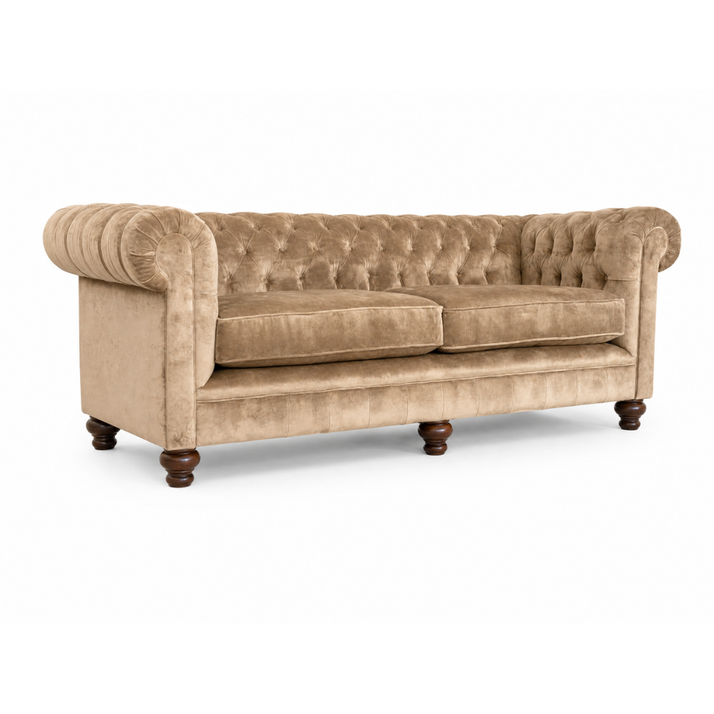 Beige velvet sofa with tufted backrest on a white background