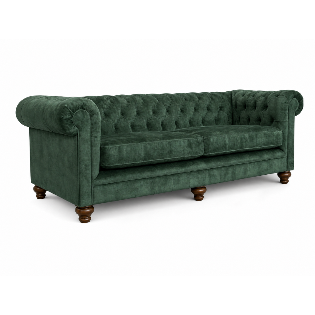 Green velvet sofa with tufted backrest on a white background