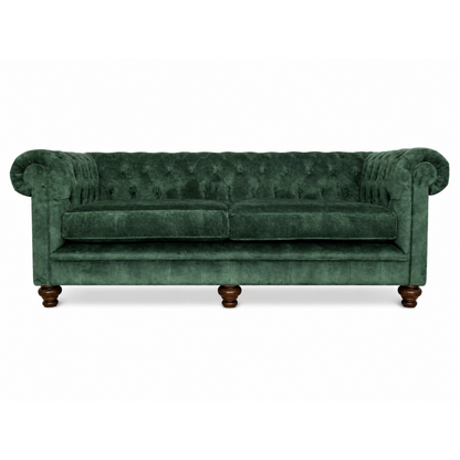 Green sofa on white background