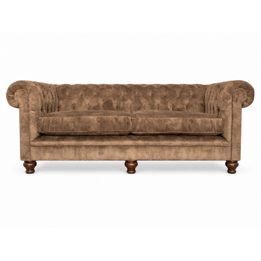 Brown velvet sofa on a white background