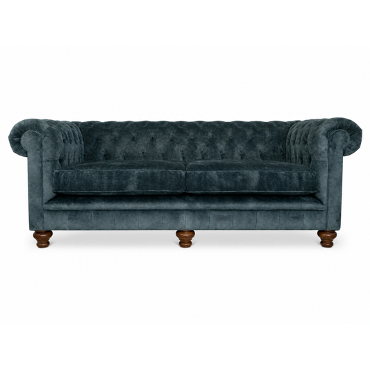 blue vlevet sofa button back on white background