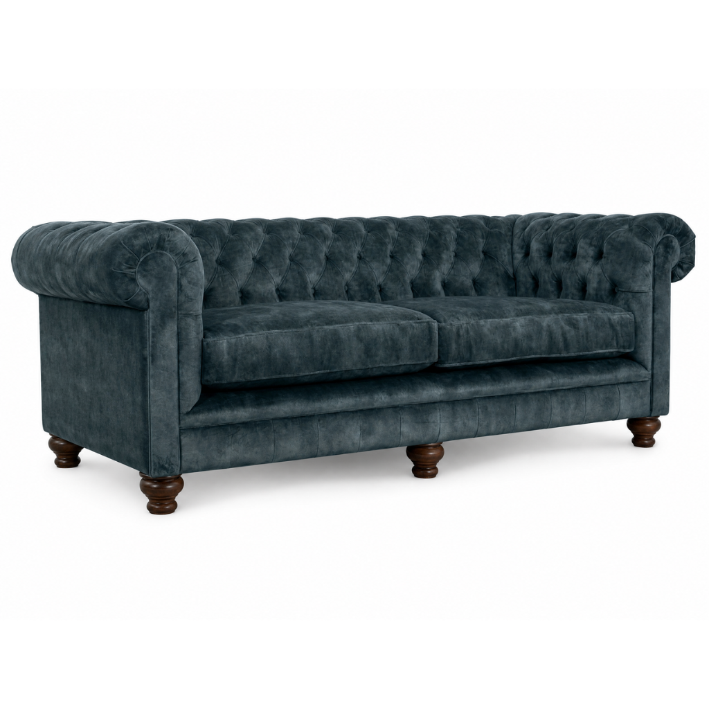 Blue velvet sofa with wooden legs on a white background