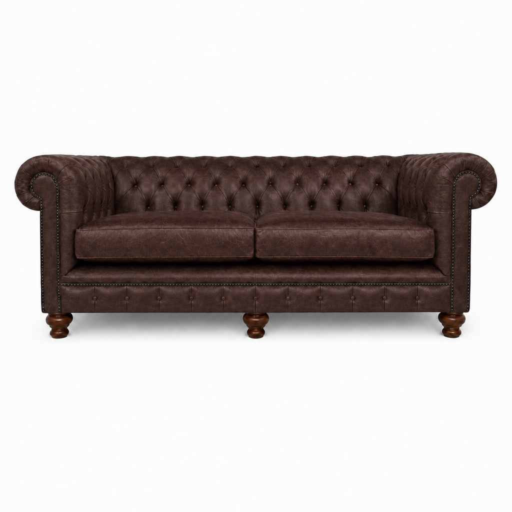 Brown leather sofa with tufted backrest on a white background