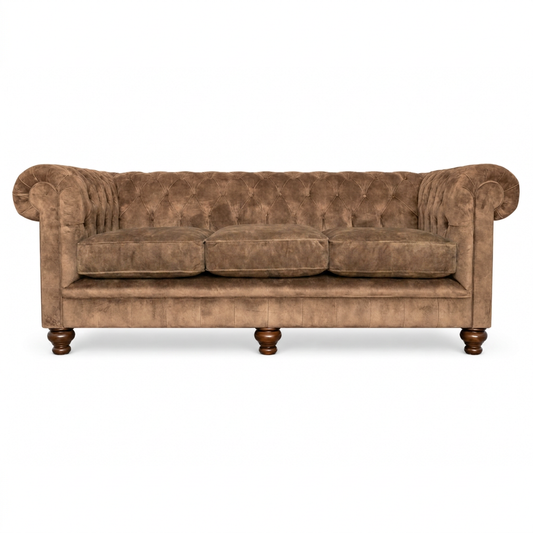 Brown velvet sofa on a white background
