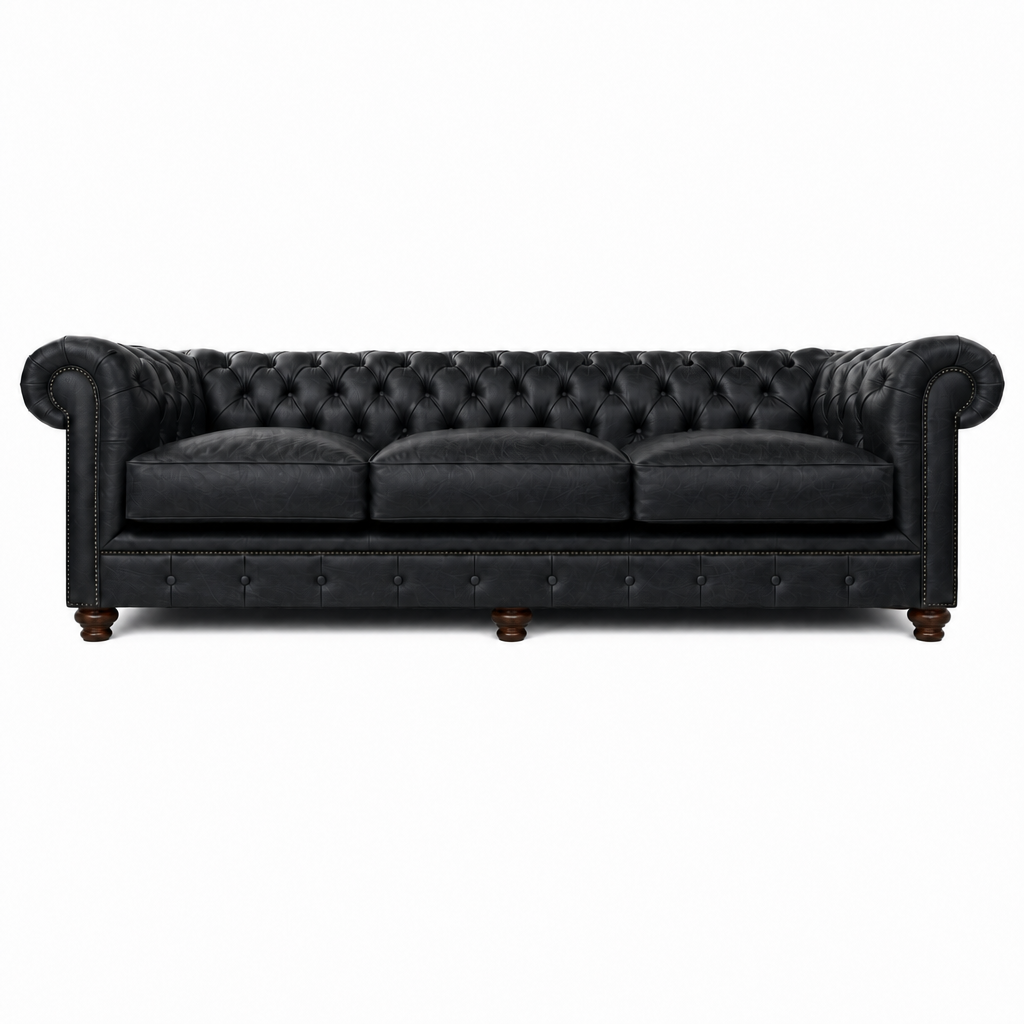 Black leather sofa with tufted backrest on a white background