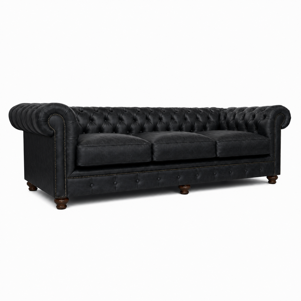 Black leather sofa with tufted backrest on a white background
