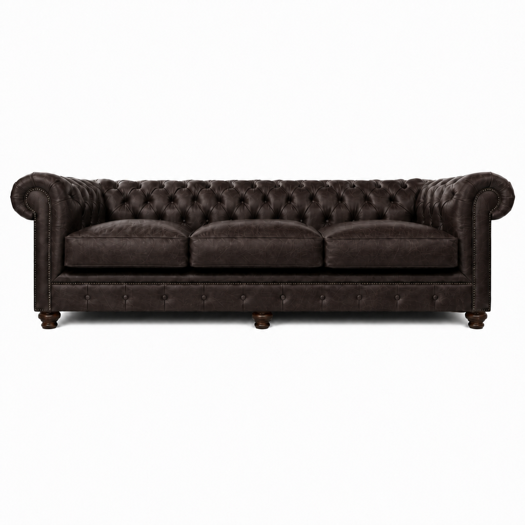 Black leather sofa with tufted backrest on a white background