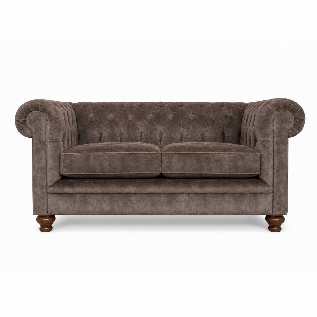 Brown velvet sofa with wooden legs on a white background