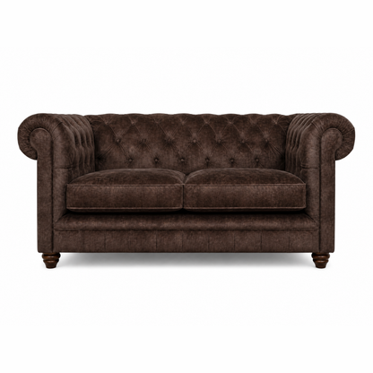 Brown velvet sofa on a white background