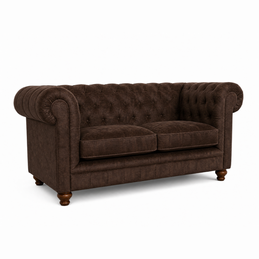 Brown sofa with tufted backrest on a white background