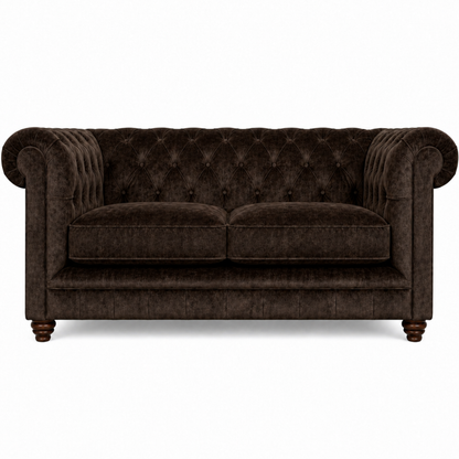 Brown velvet sofa with tufted backrest on a white background