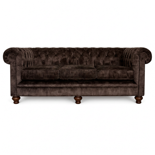 Brown velvet sofa on a white background