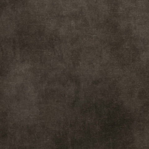 A close-up of a dark brown textured material, resembling dark brown leather or suede.