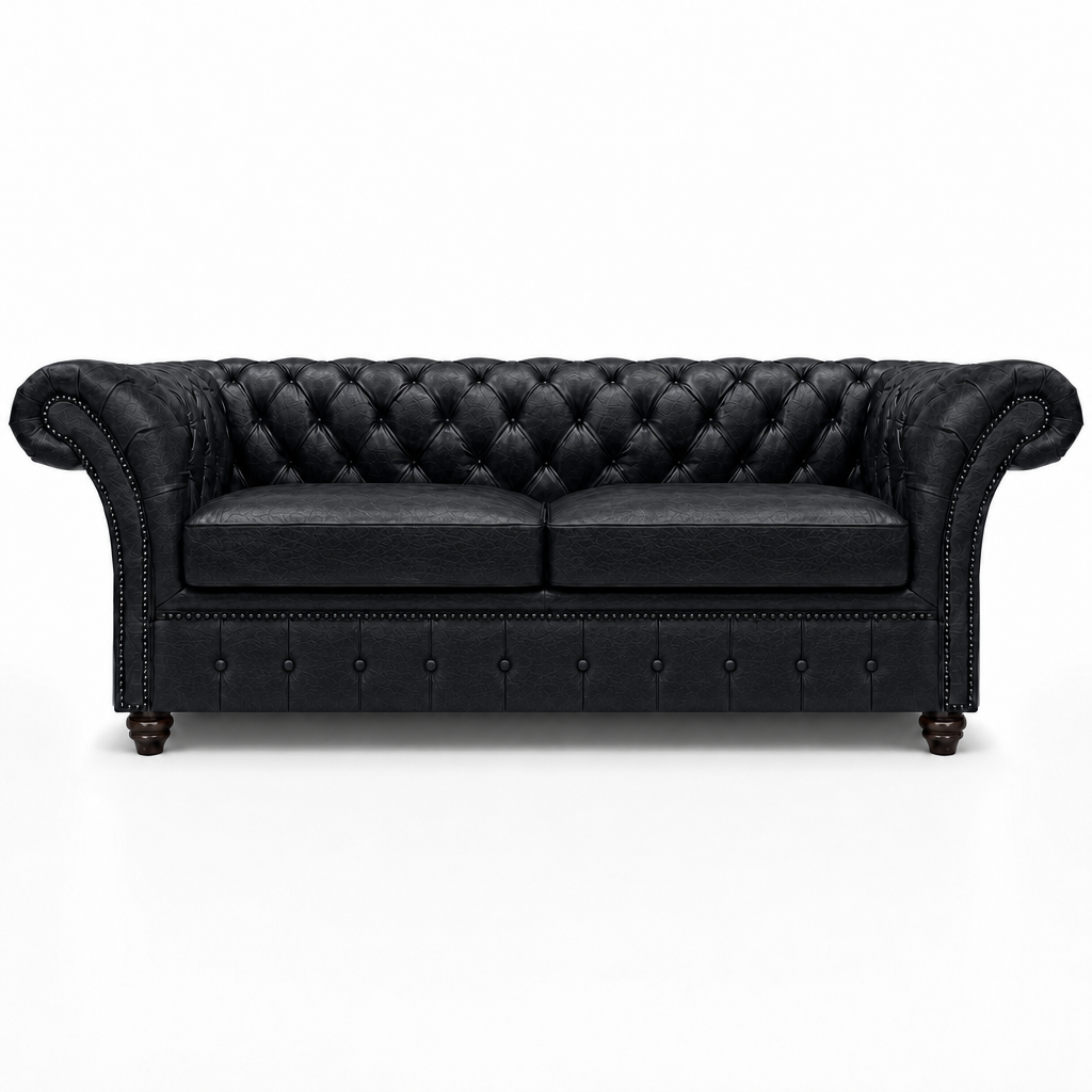 Black leather sofa with tufted backrest on a white background