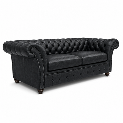 Black leather Chesterfield sofa on a white background