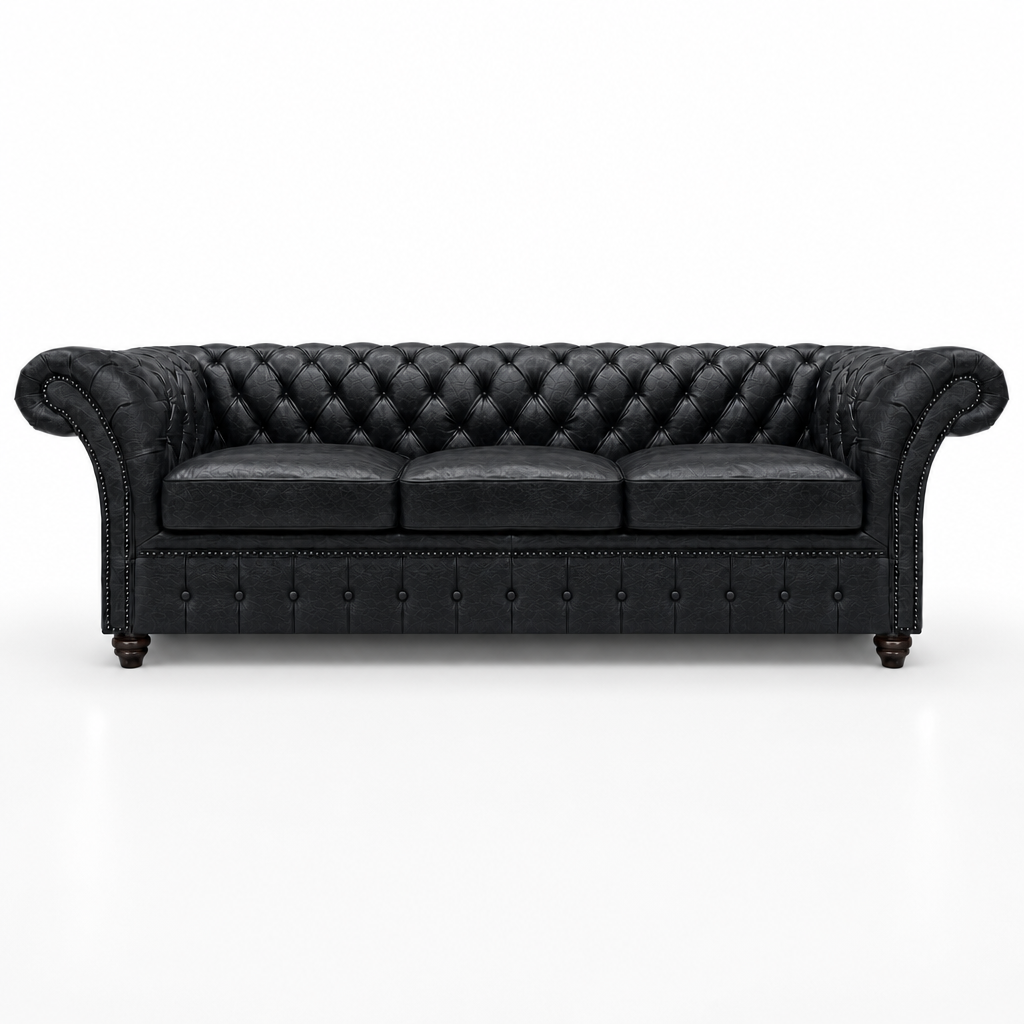 Black leather sofa with tufted backrest on a white background