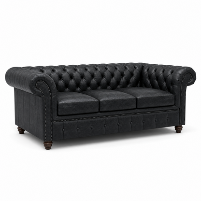 Black leather Chesterfield sofa on a white background