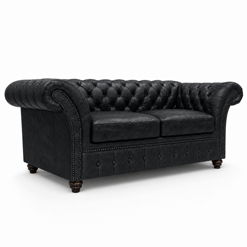 Black leather sofa with tufted backrest on a white background