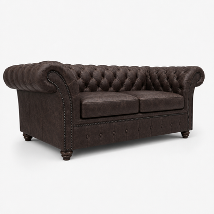 Brown tufted sofa on a white background