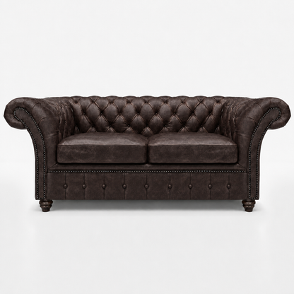 Brown leather sofa with tufted backrest on a white background