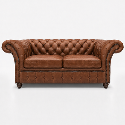 Brown leather sofa with tufted backrest on a white background