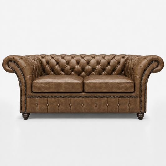 Brown leather sofa with tufted backrest on a white background