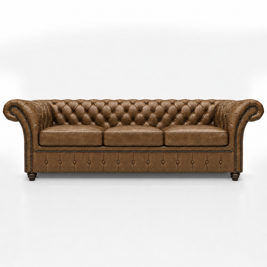 Brown leather sofa with tufted backrest on a white background