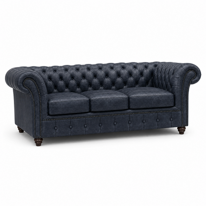 Blue tufted sofa on a white background