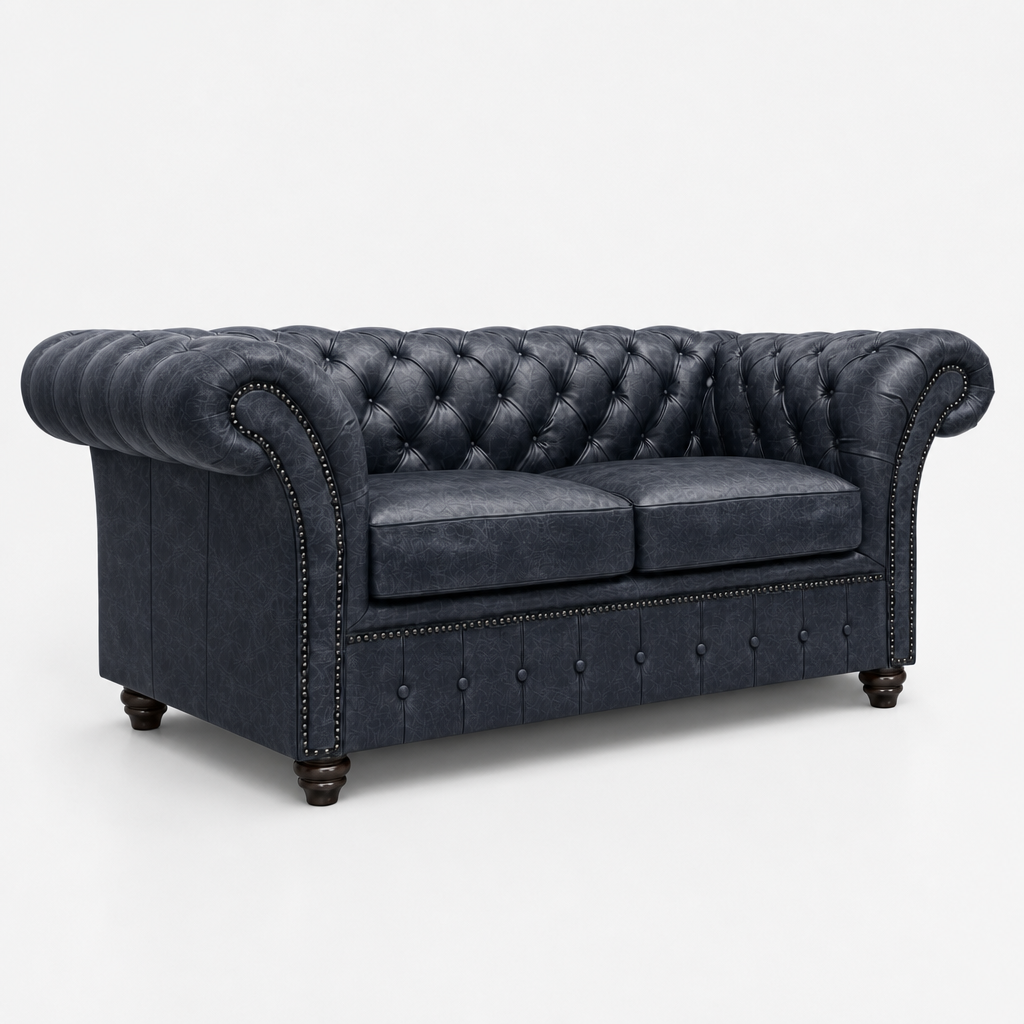 Blue tufted sofa on a white background