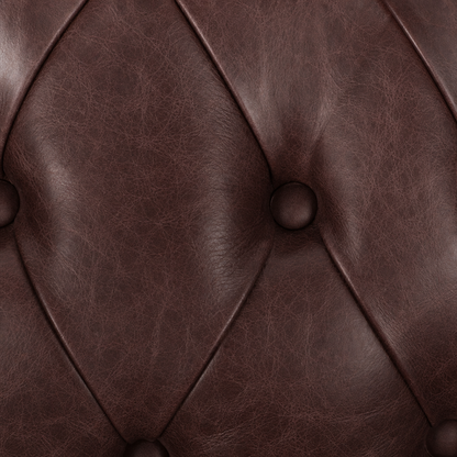 Close-up of brown leather with tufted design