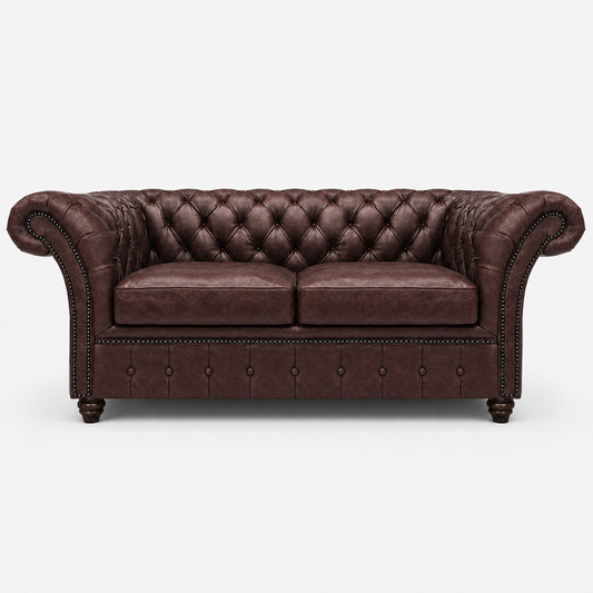 Brown leather sofa with tufted backrest on a white background