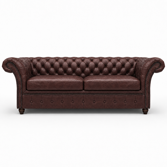 Brown leather sofa with tufted backrest on a white background