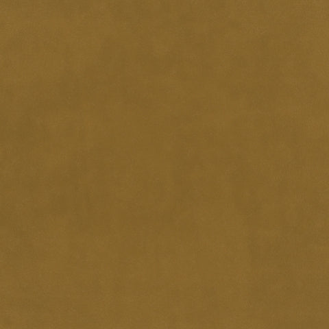 A close-up of a solid warm mustard yellow textured surface, likely a fabric or material swatch.
