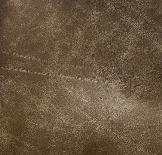 Brown leather texture with visible grain and wear