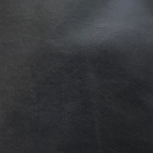Close-up of a dark gray textured surface